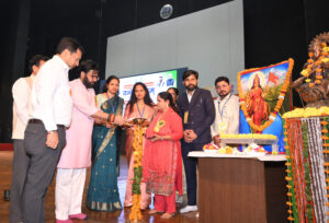 Dignitaries lighting the ceremonial lamp during Vande Mataram 150th anniversary event in Rohtak