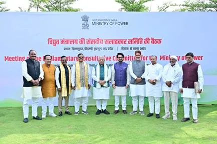 Union Minister of Power, Shri Manohar Lal, poses with Sh. Shripad Yesso Naik, Minister of State for Power, and other Members of Parliament and senior officials from the Ministry of Power, Central Electricity Authority (CEA), and CPSUs at the Consultative Committee meeting in Pinnapuram, Kurnool district, Andhra Pradesh. They are standing in two rows in front of a white banner displaying \"Government of India, Ministry of Power\" and details of the meeting in Hindi and English.