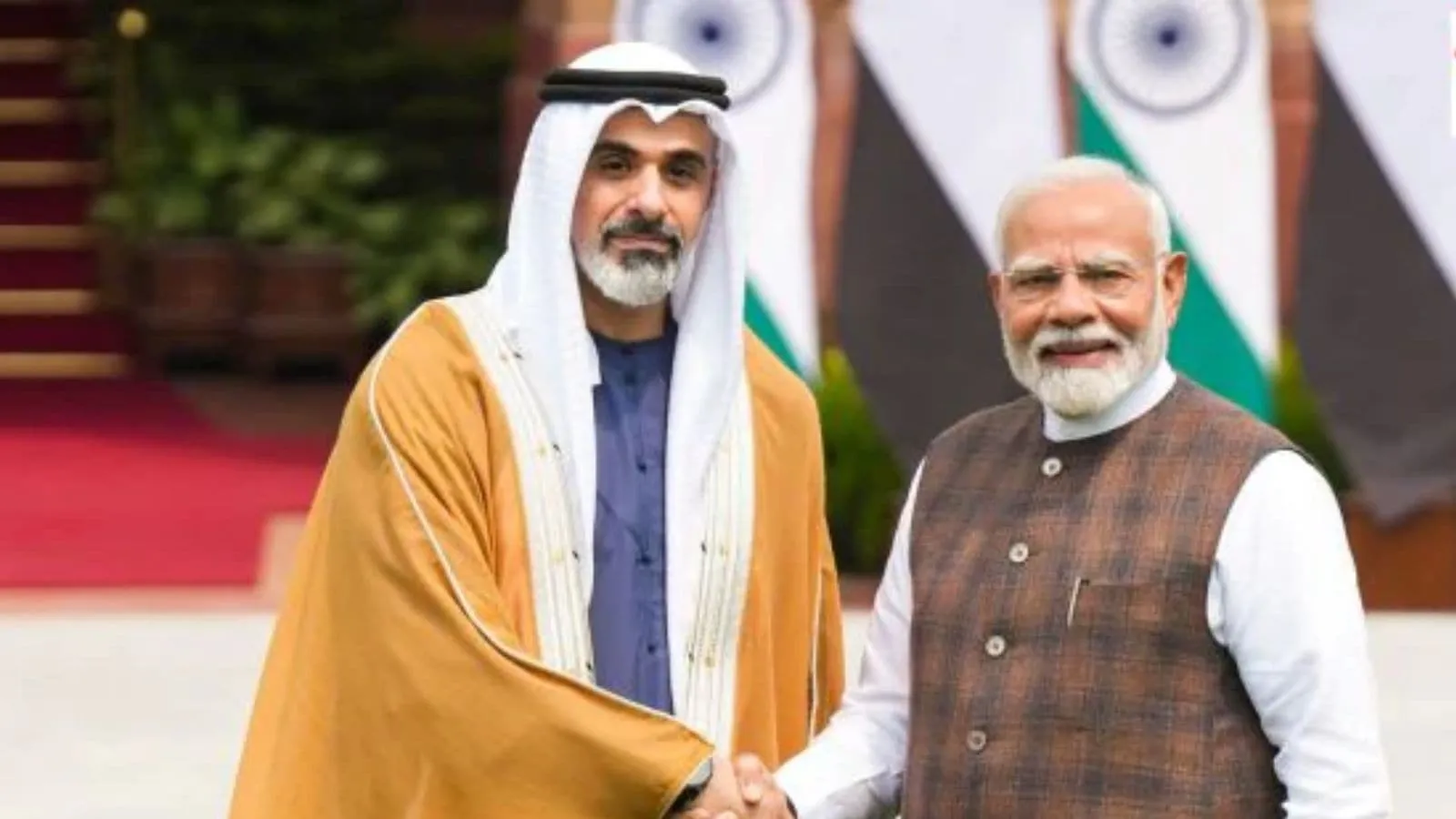 Sheikh Abdullah bin Zayed Al Nahyan shaking hands with Narendra Modi