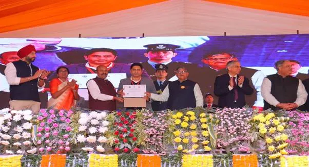 Union Minister Dr. Virendra Kumar, Punjab Governor Gulab Chand Kataria, and other dignitaries standing on stage during the 5th anniversary celebration of Nasha Mukt Bharat Abhiyaan at Guru Nanak Dev University, Amritsar