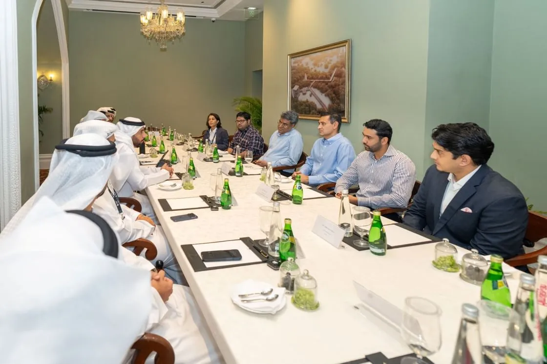Delegates from the Abu Dhabi Family Business Council and Indian business leaders seated at a long white table during a roundtable meeting in Mumbai.