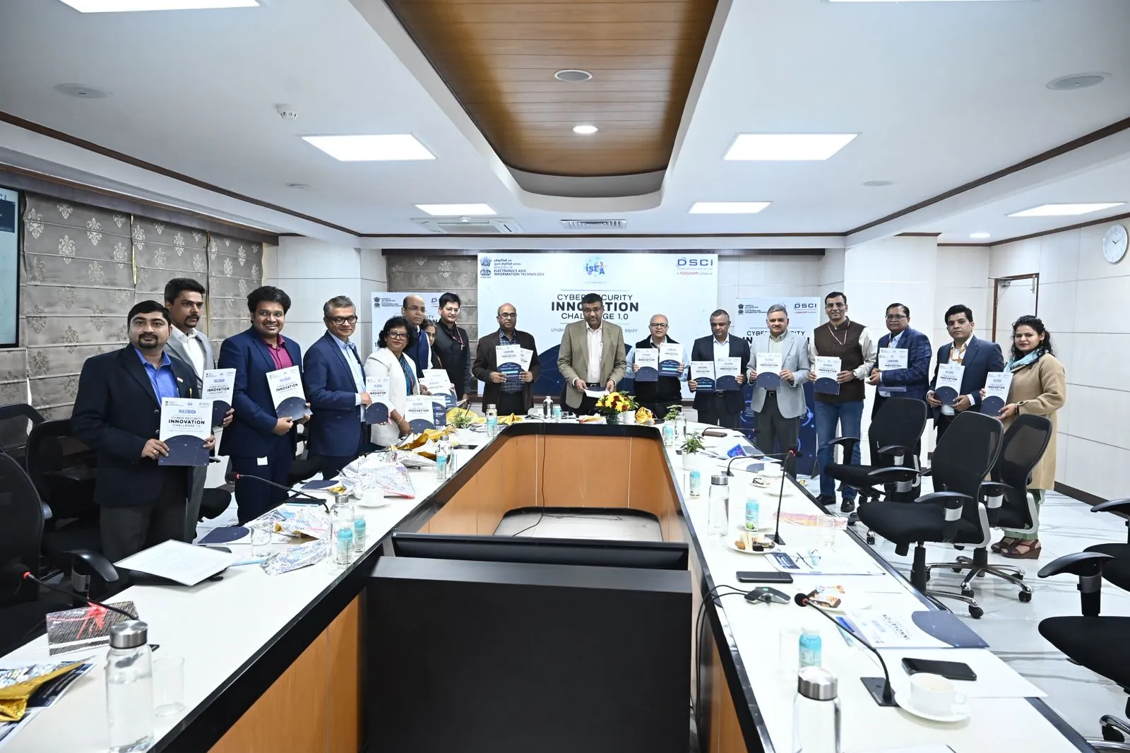 Shri S Krishnan and officials holding the rulebook at the Cyber Security Innovation Challenge 1.0 launch event at MeitY, New Delhi