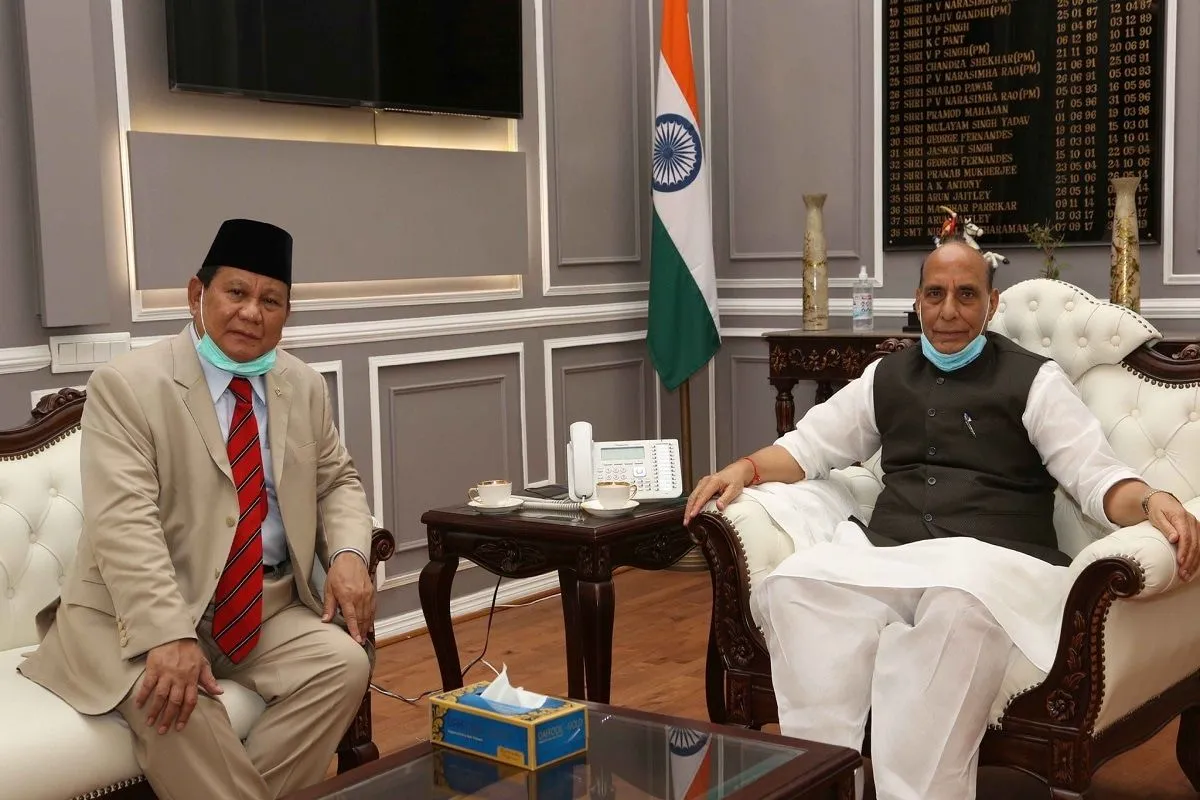 Raksha Mantri Rajnath Singh and Indonesian Defence Minister Sjafrie Sjamsoeddin seated together during bilateral defence talks in New Delhi on November 27, 2025, with the Indian national flag in the background.