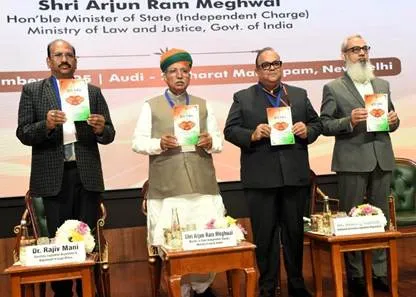 Union Minister Arjun Ram Meghwal releases the revised “Jhanda Vidhi” (Flag Code of India) along with senior dignitaries during the Chintan Shivir on Samvidhan Diwas 2025 at Bharat Mandapam, New Delhi.