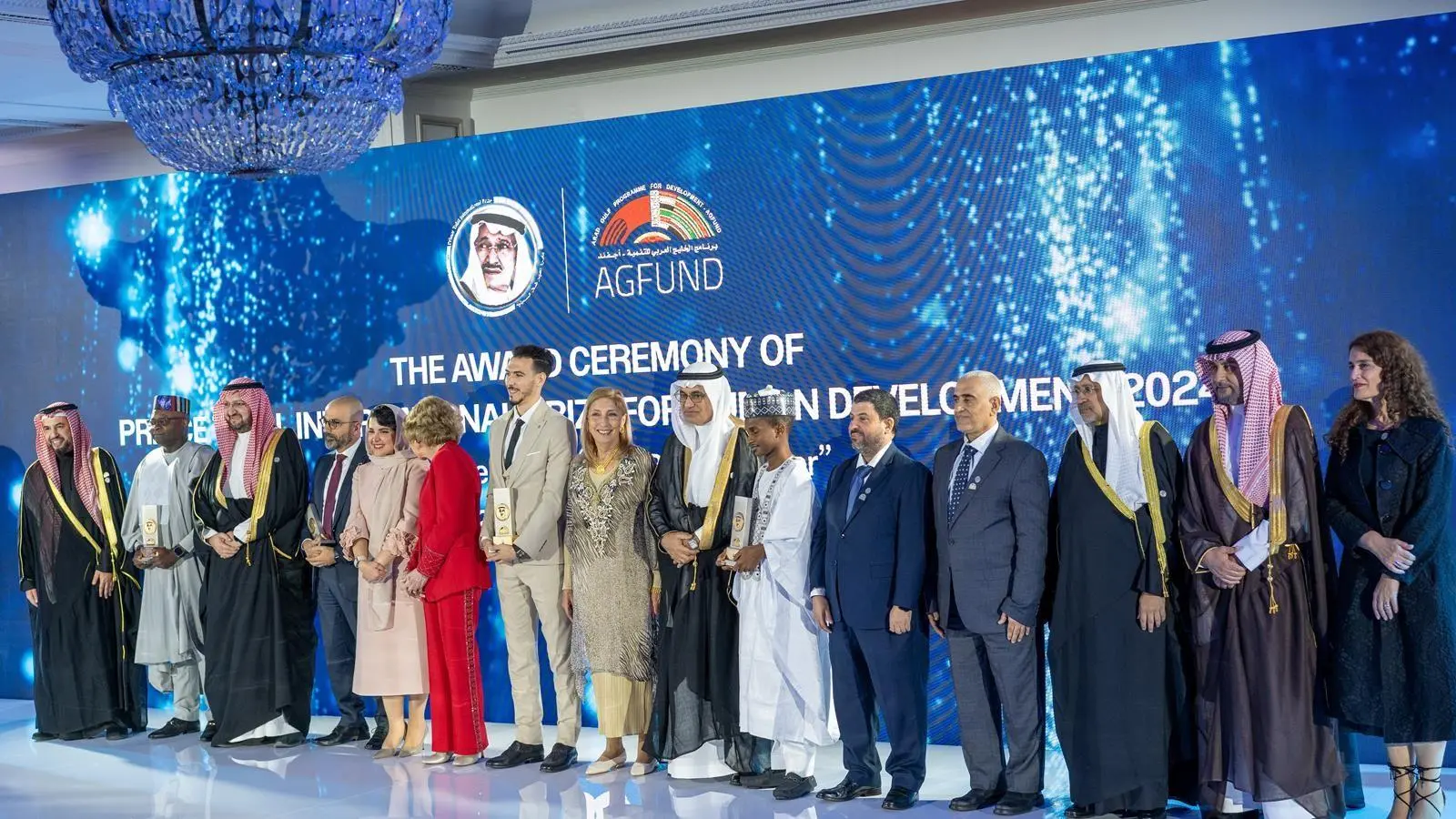 Group photo of winners and dignitaries at the Prince Talal International Prize for Human Development 2024 award ceremony in Madrid, including Prince Abdulaziz bin Talal, Queen Sofia of Spain, and representatives of winning projects focused on SDG 14 Life Below Water.