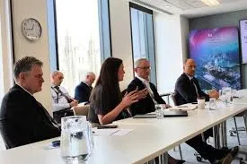 UK Energy Secretary Ed Miliband (centre-right) speaks at the launch event for the North Sea Future Plan alongside government and industry officials in London, 27 November 2025.