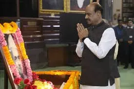 Lok Sabha Speaker Om Birla paying floral tributes with folded hands to the portrait of first Lok Sabha Speaker Ganesh Vasudev Mavalankar in Central Hall, Samvidhan Sadan, on his birth anniversary.