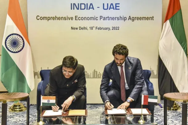 India's Commerce Minister Piyush Goyal and UAE Minister of State for Foreign Trade Dr. Thani bin Ahmed Al Zeyoudi sign the India-UAE Comprehensive Economic Partnership Agreement (CEPA) in New Delhi on 18 February 2022.