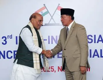 Indian Defence Minister Rajnath Singh shakes hands with Indonesian Defence Minister Sjafrie Sjamsoeddin during the 3rd India-Indonesia Defence Ministers’ Dialogue in New Delhi on November 28, 2025.